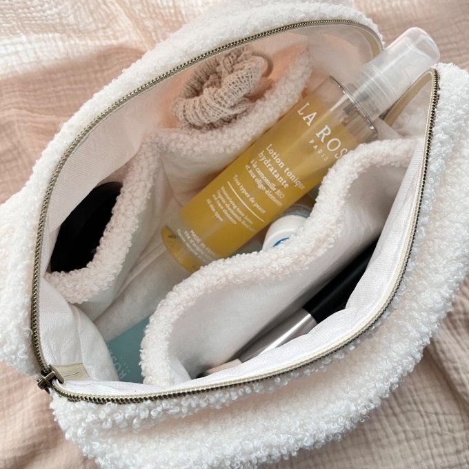 La trousse de toilette modèle "Bouclette" coloris blanc